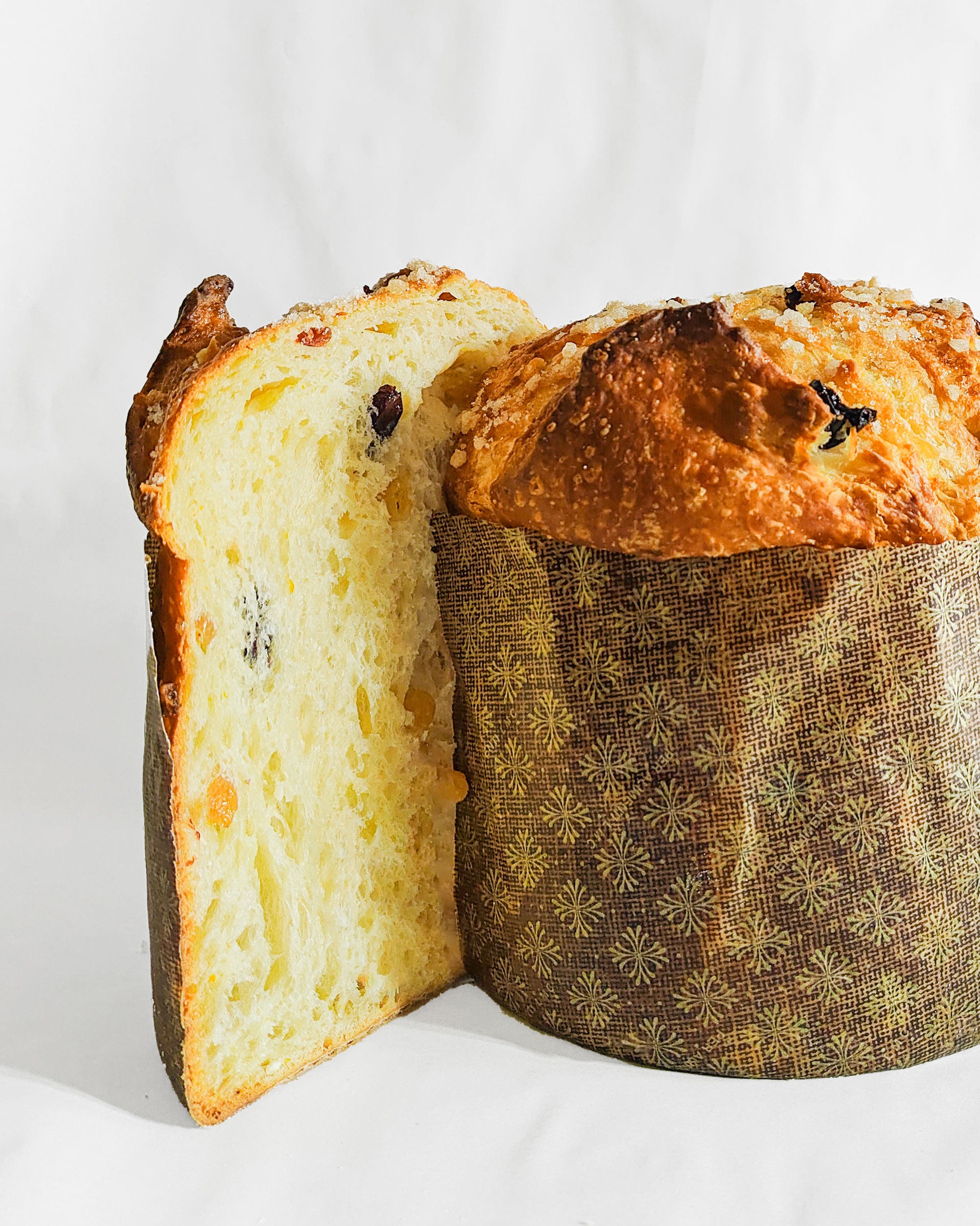 Zubi Bakes Panettone Classico, showing a sliced view of the delicate open yellow crumb.